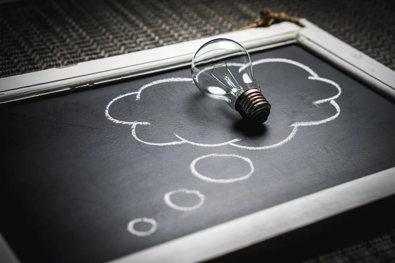 lightbulb in chalk cloud