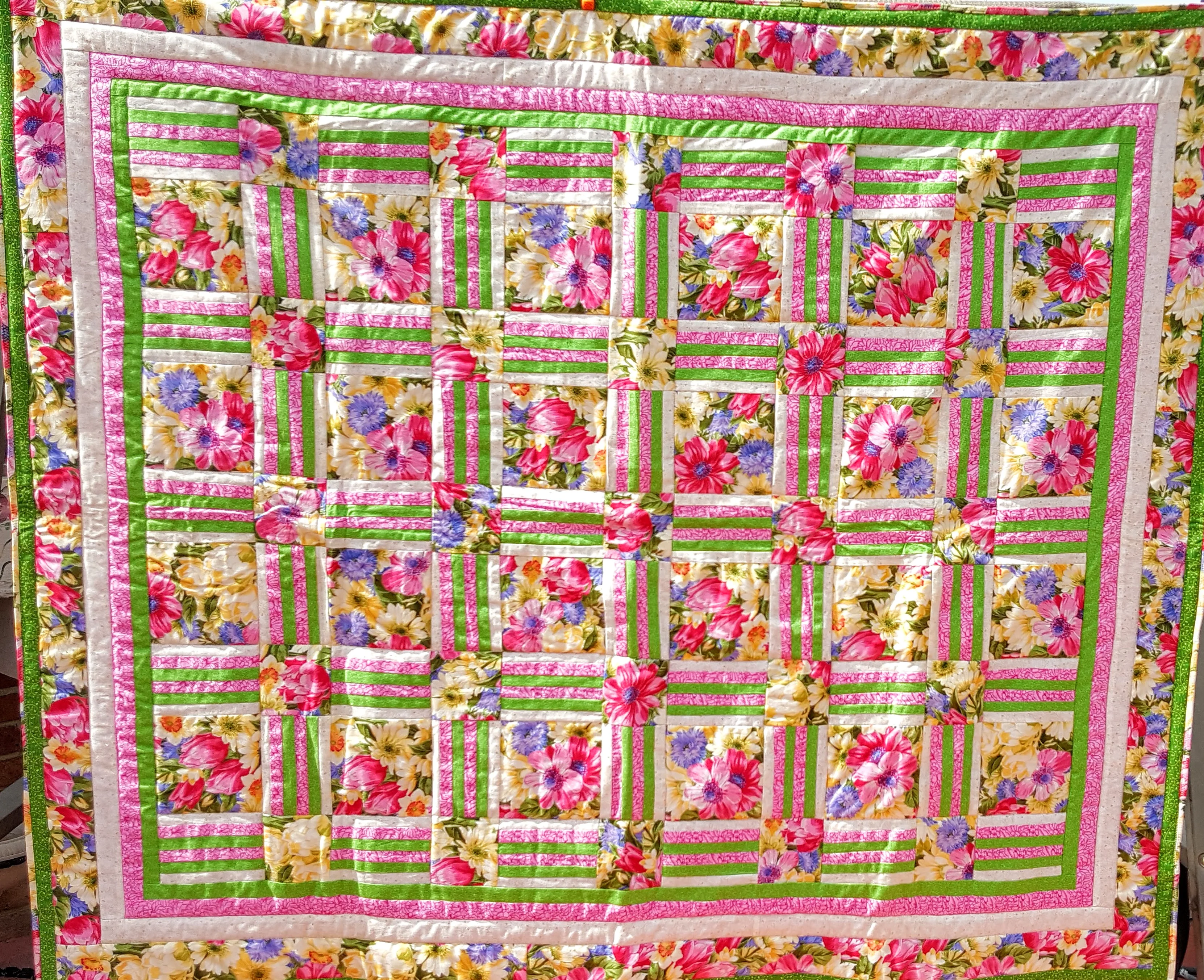 rose-colored floral Squares quilt